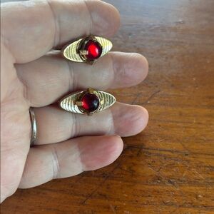 MCM Anson oval gold tone lucite round ruby red center bullet toggle cuff links